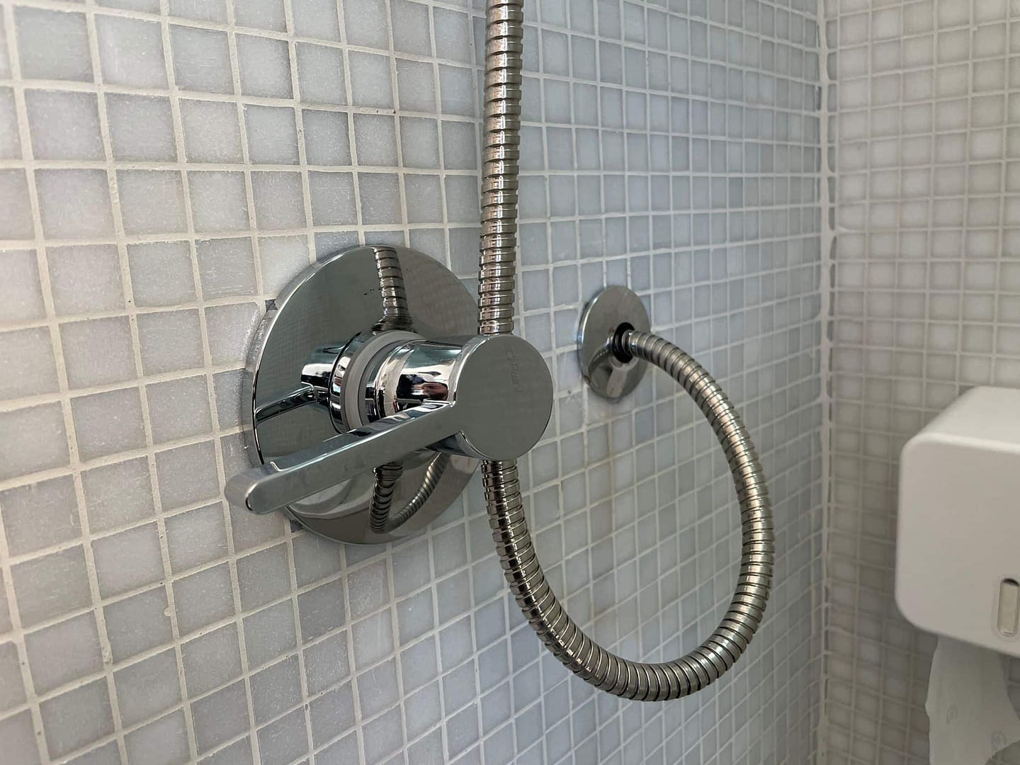 shower in DIY camper van - faucet