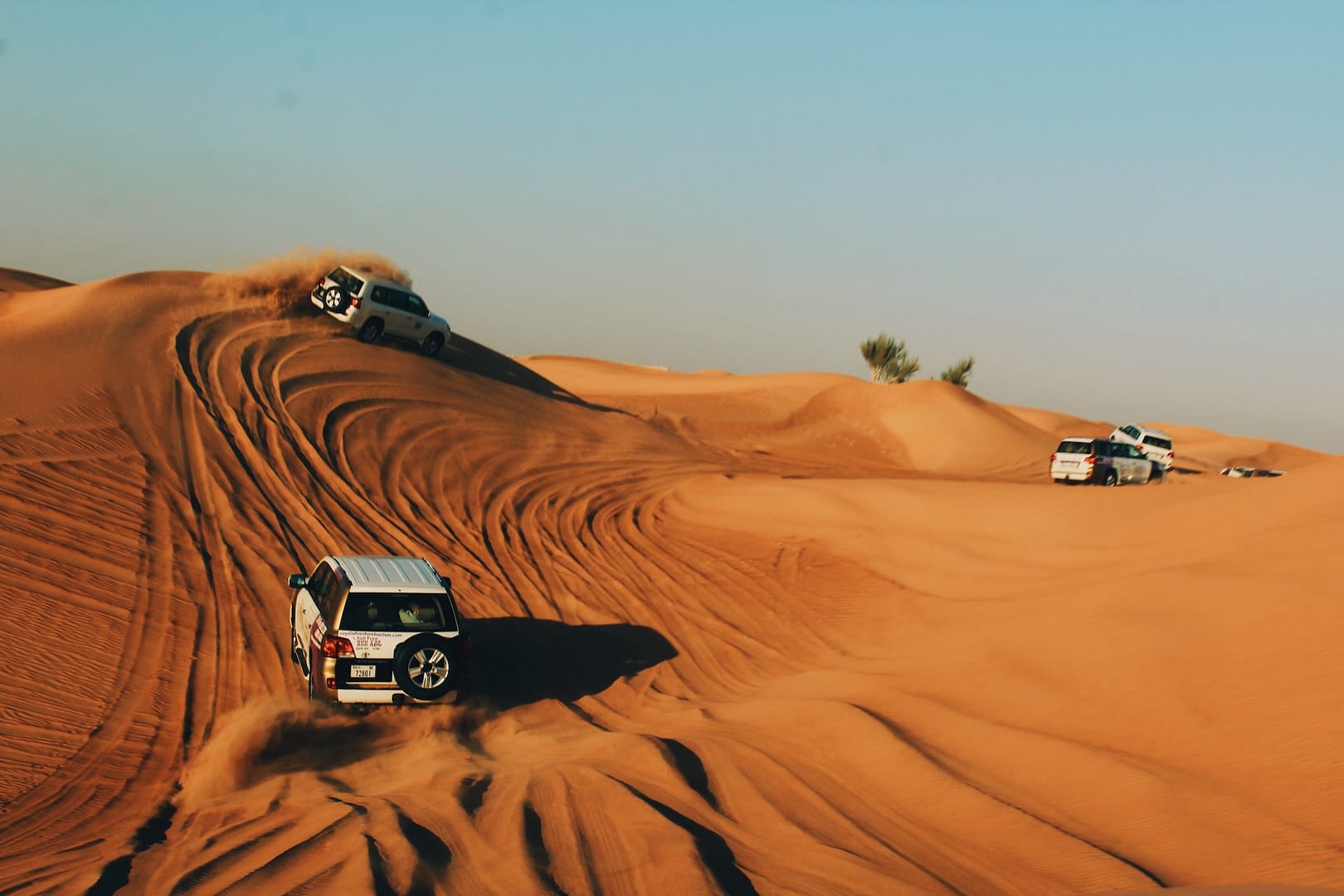 Safari in Dubai - cars 4x4 on the dunes