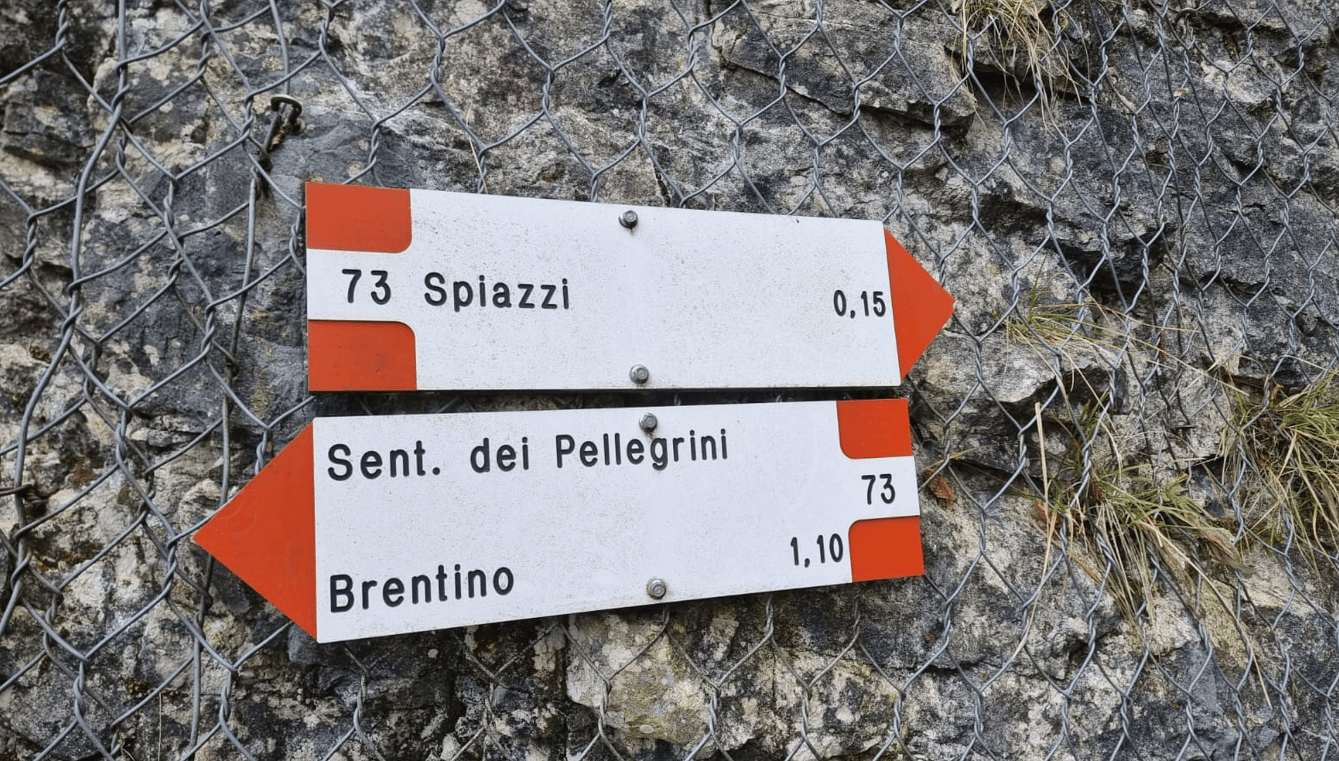how to get to the shrine of madonna della corona - road sign with distance from Spiazzi and Brentino